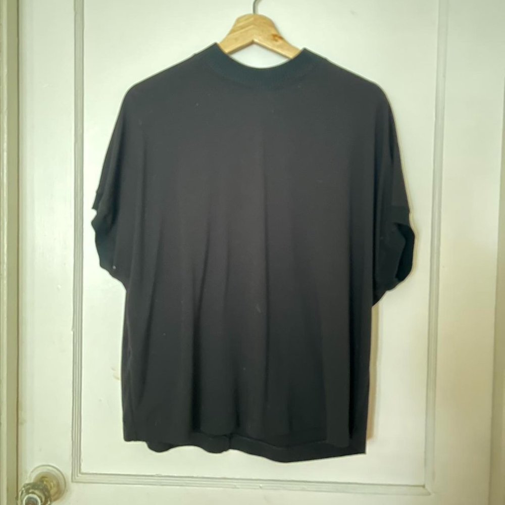 Mango brand black mock neck blouse with drop sleeves and a ribbed neck/arm cuffs